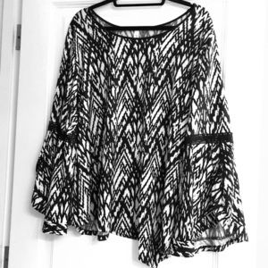 Flowy black and white print top with bell sleeves